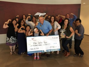 America's Christian Credit Union CEO Mendell Thompson and staff raised money to help kick off Khloe's next book drive benefitting CHLA