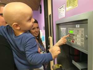 Aiden shows GCN reporter Zak Bushey his favorite thing to do with the nurses at Children's Hospital, using their Pneumatic Tube.