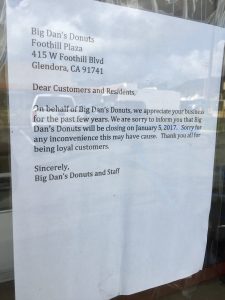 A letter left on the window of Big Dan's Donuts announcing the closure.