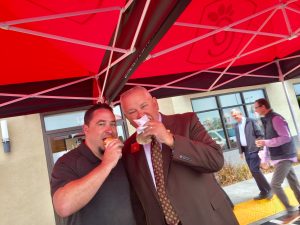 City Council Member Mendell Thompson along with GCN's Zak Bushey enjoy the ceremonial "first bite"